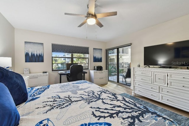 bedroom with light wood finished floors, access to outside, and a ceiling fan
