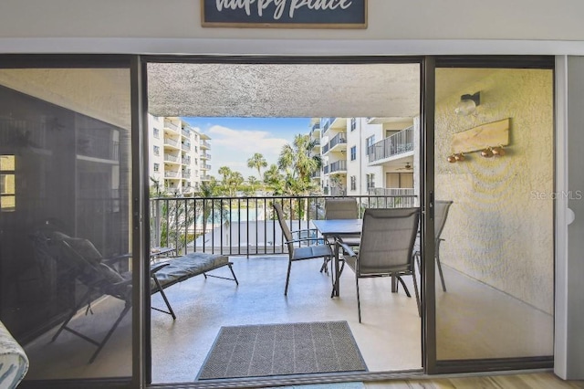 balcony featuring outdoor dining area