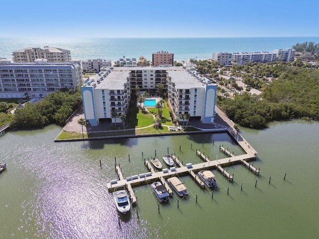aerial view with a city view and a water view