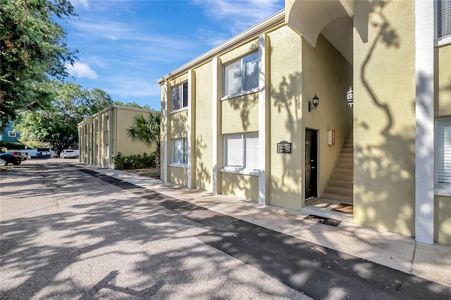 3206 W Azeele St Unit 126, Tampa, FL 33609 - doorway to property with stucco siding