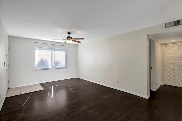 3206 W Azeele St Unit 126, Tampa, FL 33609 - spare room featuring ceiling fan, baseboards, and wood finished floors