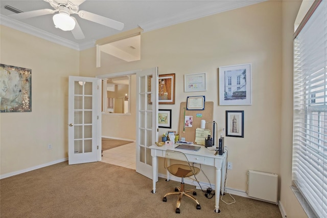 home office with visible vents, crown molding, ceiling fan, carpet floors, and french doors