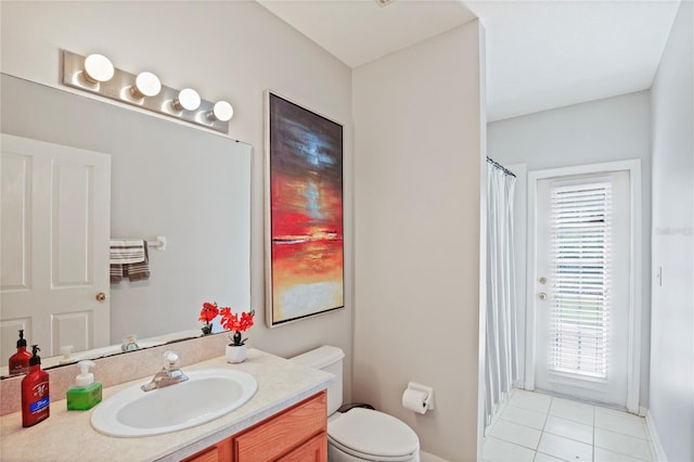full bathroom with curtained shower, toilet, tile patterned floors, and vanity