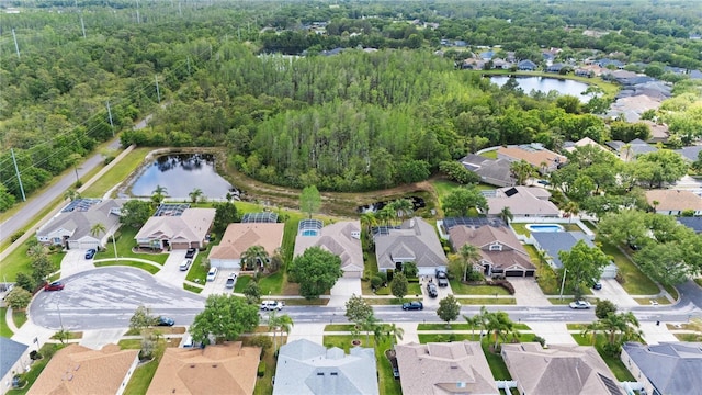 aerial view featuring a water view and a residential view