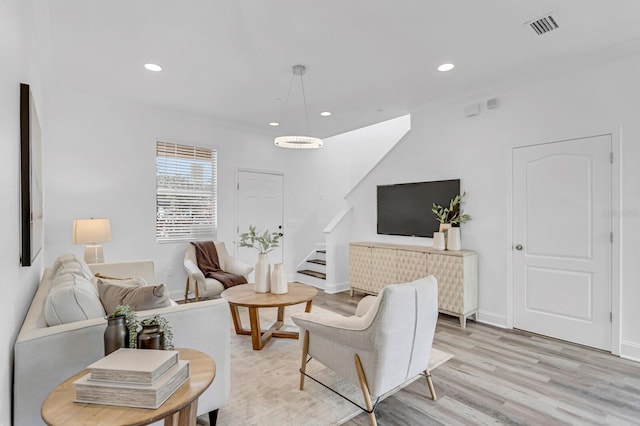 2410 W N A St Unit 2, Tampa, FL 33609 - living area featuring baseboards, recessed lighting, stairs, visible vents, and light wood finished floors