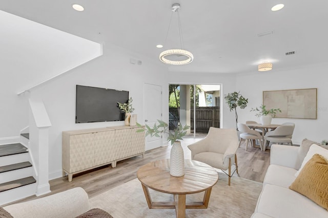 2410 W N A St Unit 2, Tampa, FL 33609 - living area featuring visible vents, a chandelier, light wood-style floors, recessed lighting, and stairway