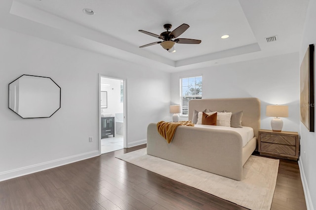 2410 W N A St Unit 2, Tampa, FL 33609 - bedroom featuring visible vents, baseboards, wood finished floors, and a raised ceiling