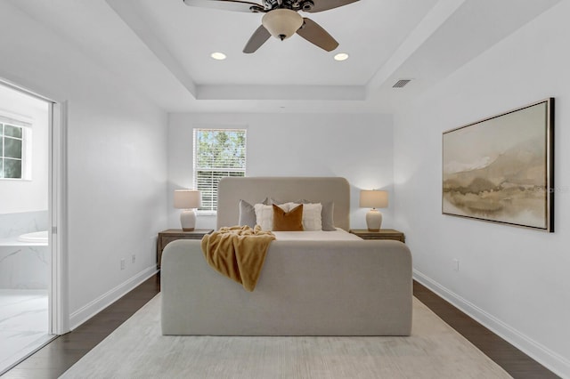 2410 W N A St Unit 2, Tampa, FL 33609 - bedroom featuring a tray ceiling, baseboards, and visible vents