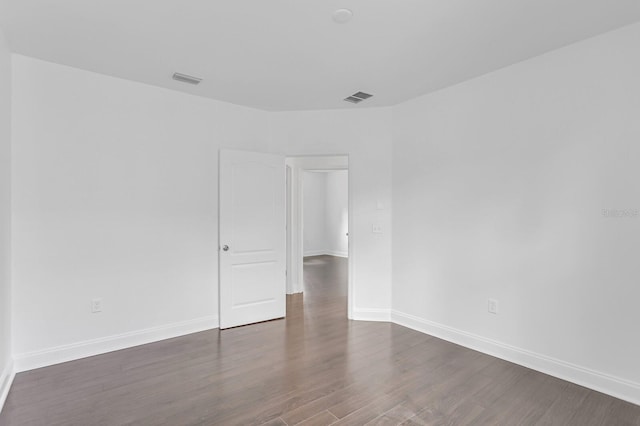 2410 W N A St Unit 2, Tampa, FL 33609 - spare room featuring wood finished floors, baseboards, and visible vents