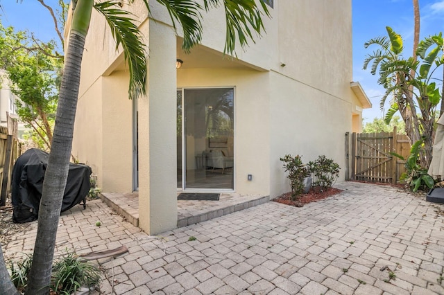 2410 W N A St Unit 2, Tampa, FL 33609 - view of patio featuring fence, a gate, and area for grilling