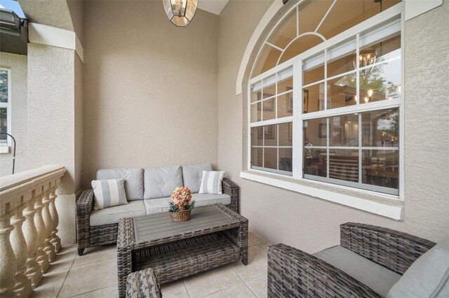 121 Colonial St SW, Port Charlotte, FL 33952 - balcony featuring outdoor lounge area