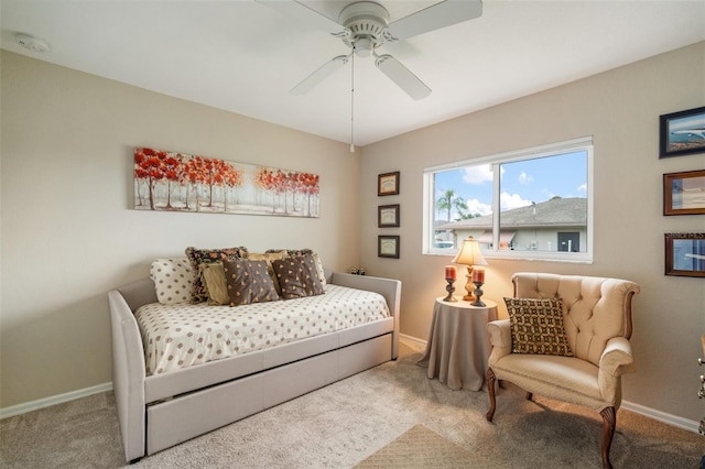 121 Colonial St SW, Port Charlotte, FL 33952 - carpeted bedroom with baseboards and ceiling fan