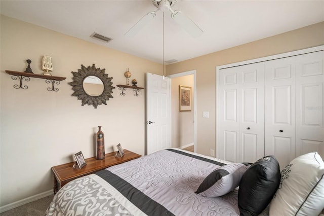 121 Colonial St SW, Port Charlotte, FL 33952 - carpeted bedroom featuring baseboards, visible vents, a closet, and a ceiling fan