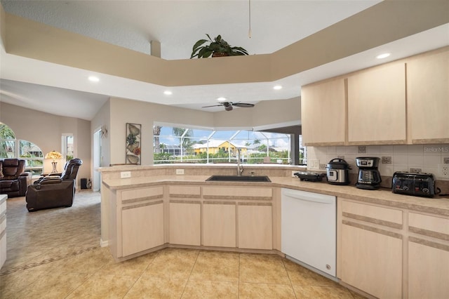121 Colonial St SW, Port Charlotte, FL 33952 - kitchen with dishwasher, open floor plan, a sink, and light brown cabinets
