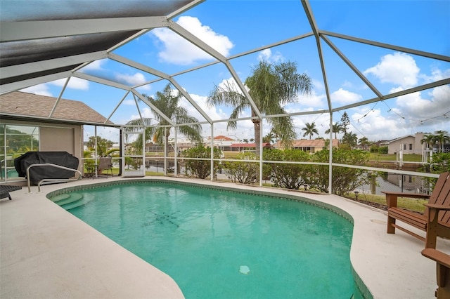 121 Colonial St SW, Port Charlotte, FL 33952 - outdoor pool featuring a lanai and a patio area