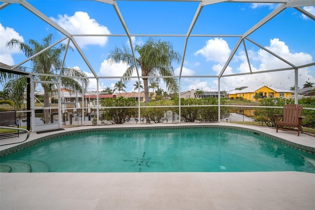 121 Colonial St SW, Port Charlotte, FL 33952 - outdoor pool with a lanai and a patio area