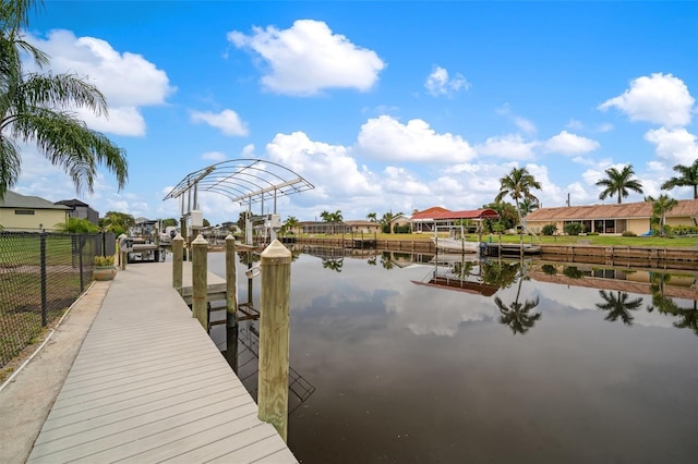 121 Colonial St SW, Port Charlotte, FL 33952 - dock area with a residential view, boat lift, a water view, and fence