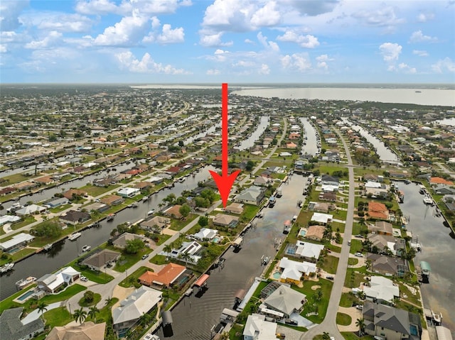121 Colonial St SW, Port Charlotte, FL 33952 - aerial view featuring a residential view and a water view