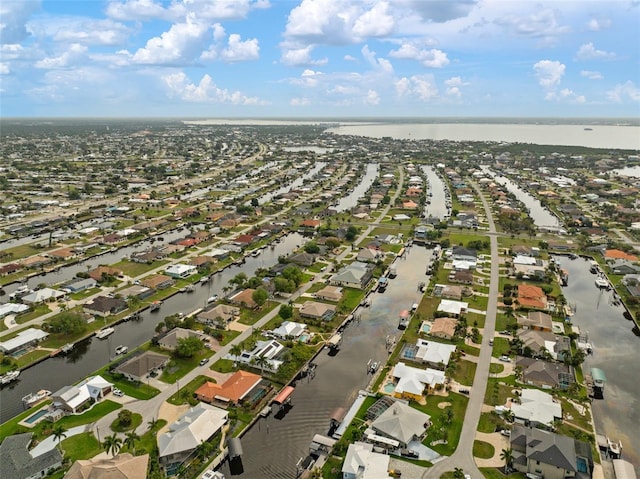 121 Colonial St SW, Port Charlotte, FL 33952 - birds eye view of property featuring a water view and a residential view