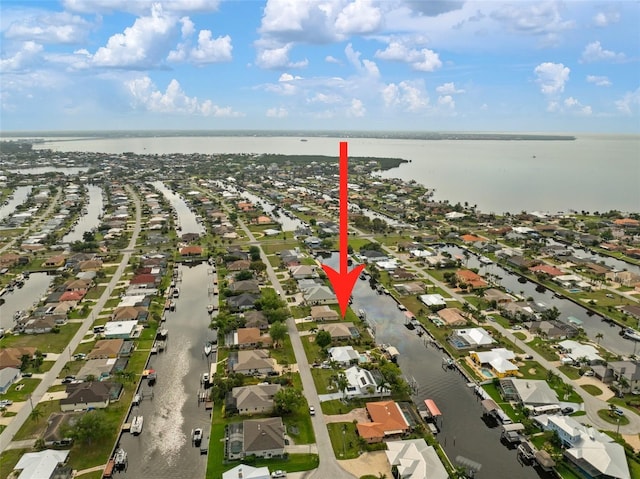 121 Colonial St SW, Port Charlotte, FL 33952 - drone / aerial view featuring a residential view and a water view