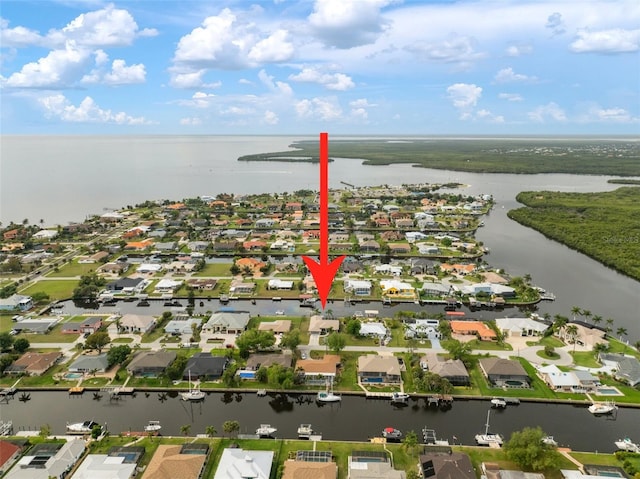 121 Colonial St SW, Port Charlotte, FL 33952 - aerial view featuring a water view and a residential view
