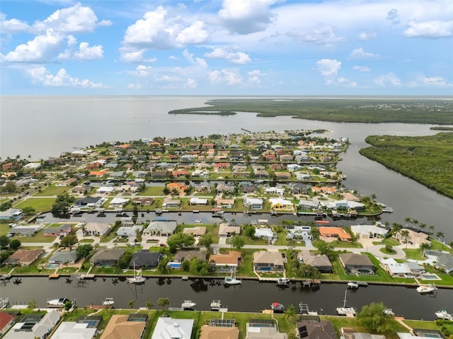 121 Colonial St SW, Port Charlotte, FL 33952 - birds eye view of property featuring a water view and a residential view
