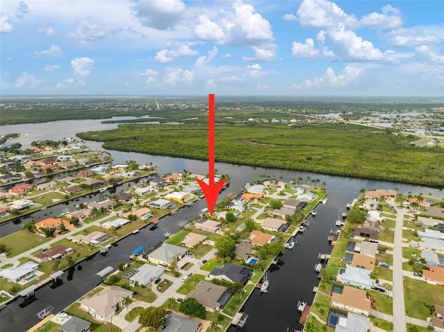 121 Colonial St SW, Port Charlotte, FL 33952 - drone / aerial view with a residential view and a water view