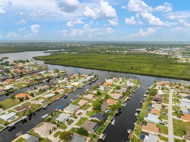 121 Colonial St SW, Port Charlotte, FL 33952 - drone / aerial view with a residential view and a water view