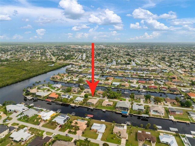 121 Colonial St SW, Port Charlotte, FL 33952 - bird's eye view with a water view and a residential view