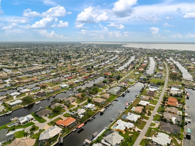 121 Colonial St SW, Port Charlotte, FL 33952 - birds eye view of property with a water view and a residential view
