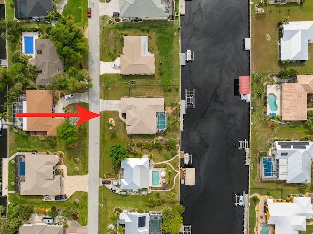 121 Colonial St SW, Port Charlotte, FL 33952 - drone / aerial view with a residential view and a water view