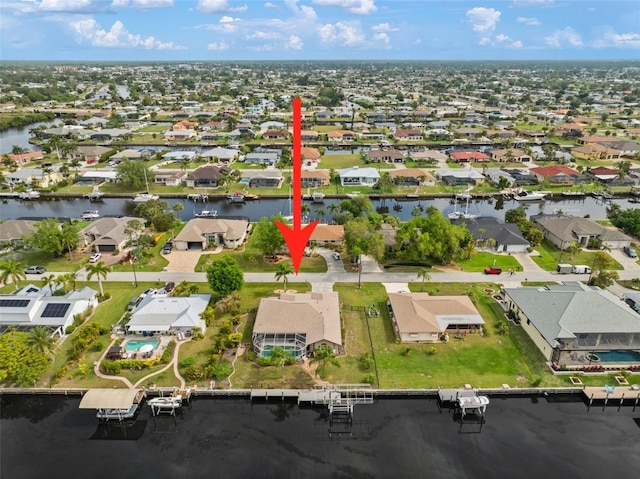 121 Colonial St SW, Port Charlotte, FL 33952 - bird's eye view with a residential view and a water view