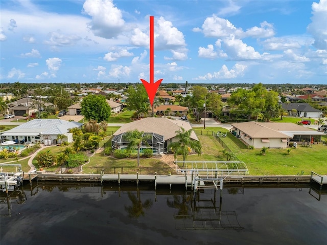121 Colonial St SW, Port Charlotte, FL 33952 - drone / aerial view featuring a residential view and a water view
