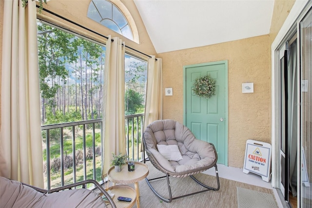 9481 Highland Oak Dr Unit 1616, Tampa, FL 33647 - sunroom / solarium featuring vaulted ceiling