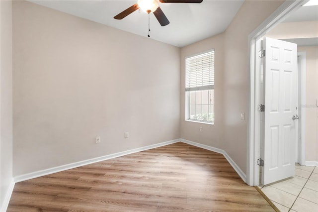 2009 River Turia Cir, Riverview, FL 33578 - empty room with baseboards, ceiling fan, and light wood finished floors