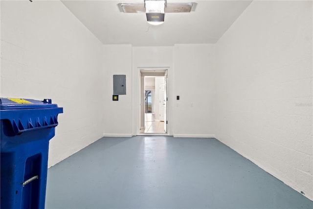 2009 River Turia Cir, Riverview, FL 33578 - garage with a garage door opener, electric panel, and concrete block wall