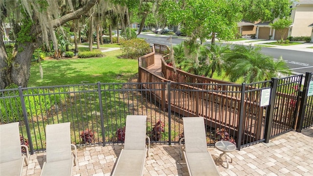 2009 River Turia Cir, Riverview, FL 33578 - view of property's community featuring a yard and fence