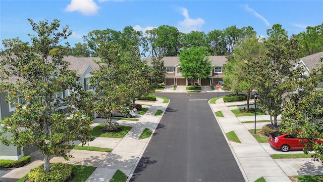 2009 River Turia Cir, Riverview, FL 33578 - view of street with traffic signs, a residential view, sidewalks, and curbs