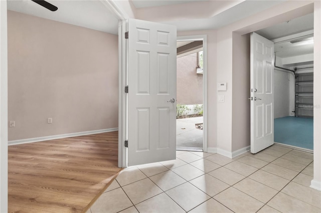 2009 River Turia Cir, Riverview, FL 33578 - unfurnished room featuring baseboards, plenty of natural light, and light tile patterned flooring