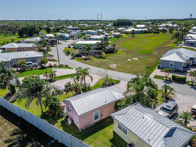 birds eye view of property with a residential view