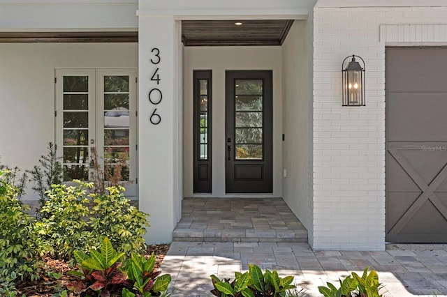 3406 W Alline Ave, Tampa, FL 33611 - view of exterior entry featuring french doors