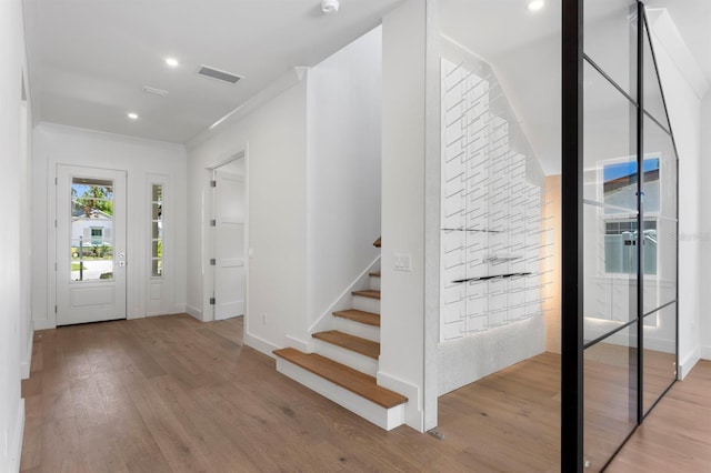 3406 W Alline Ave, Tampa, FL 33611 - foyer entrance with wood finished floors, stairs, recessed lighting, and baseboards