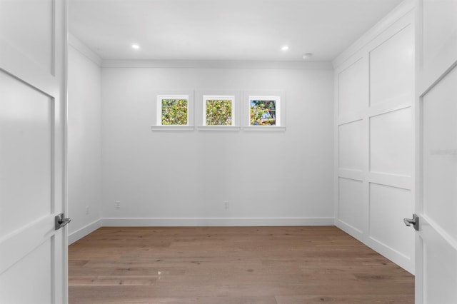 3406 W Alline Ave, Tampa, FL 33611 - unfurnished bedroom with light wood-style flooring, baseboards, and recessed lighting