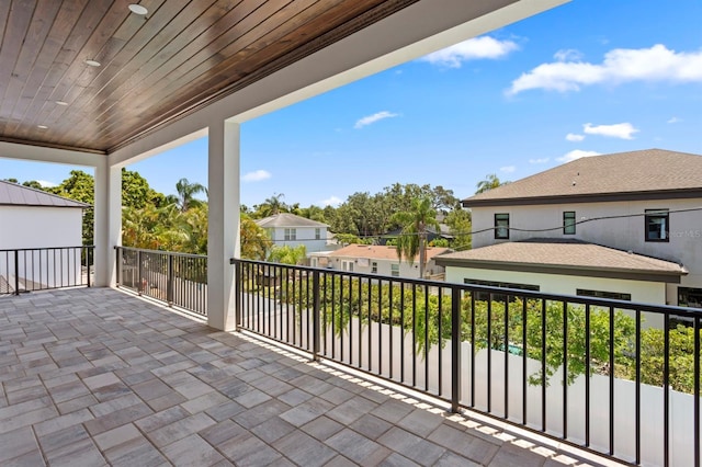 3406 W Alline Ave, Tampa, FL 33611 - view of patio featuring a balcony and a residential view