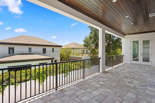 3406 W Alline Ave, Tampa, FL 33611 - view of patio with french doors and a balcony
