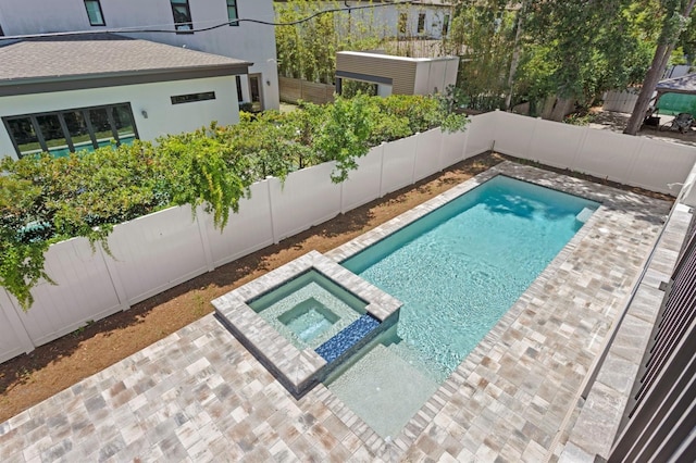 3406 W Alline Ave, Tampa, FL 33611 - view of pool featuring a fenced backyard, a pool with connected hot tub, and a patio area