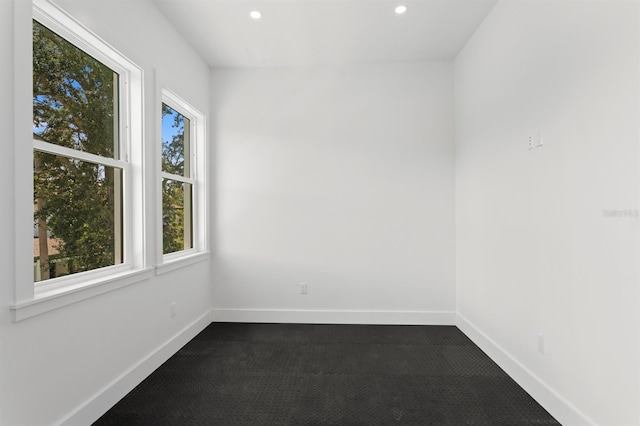 3406 W Alline Ave, Tampa, FL 33611 - spare room featuring recessed lighting, baseboards, and dark carpet