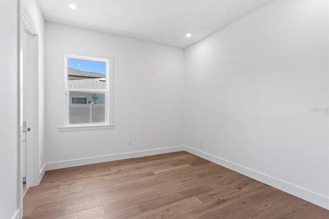 3406 W Alline Ave, Tampa, FL 33611 - spare room with light wood-style flooring, baseboards, and recessed lighting