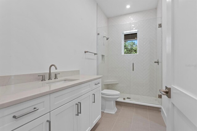 3406 W Alline Ave, Tampa, FL 33611 - full bathroom featuring vanity, tile patterned floors, a stall shower, and toilet