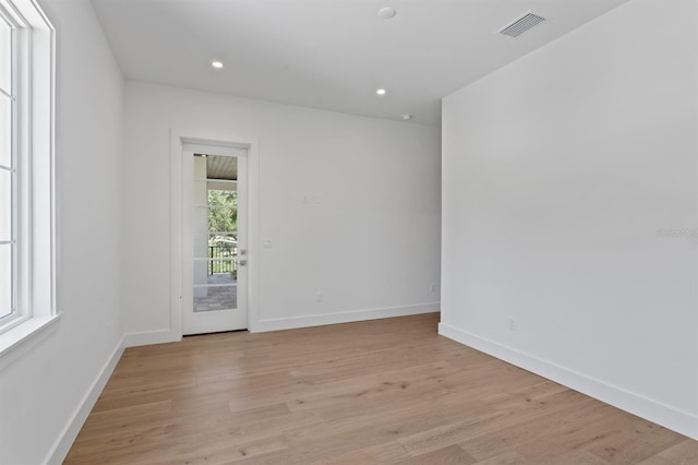 3406 W Alline Ave, Tampa, FL 33611 - spare room featuring light wood-style flooring, baseboards, and recessed lighting